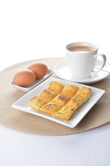 egg french toast bread set with half boiled egg and coffee or tea in white background asian halal menu
