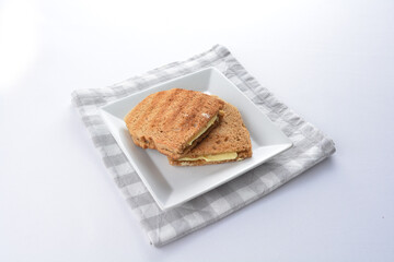 butter toast bread set with half boiled egg and coffee or tea in white background asian halal menu