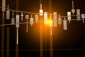 Abstract financial trading graphs and digital number of foreign exchange market trading on monitor. Background of gold and blue digital chart to represent stock market trend.