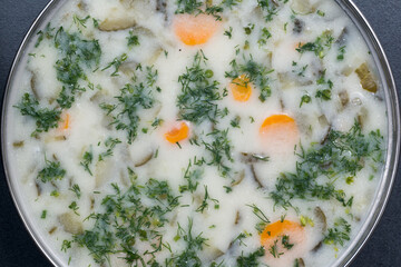 Cucumber soup in pot closeup