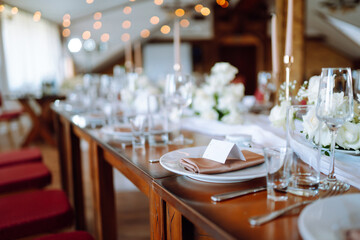 Wedding. Banquet. Luxury rich table setting for a wedding celebration, party in nice cozy restaurant. 