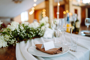Wedding. Banquet. Luxury rich table setting for a wedding celebration, party in nice cozy restaurant. 