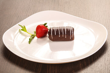Sweet chocolate cake served strawberry