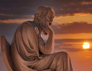 Socrates the ancient Greek philosopher marble statue under dramatic sky