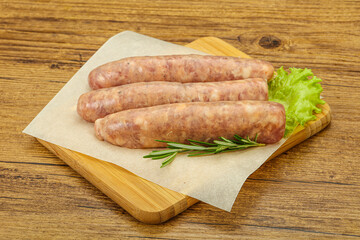Raw pork meat sausages for grill