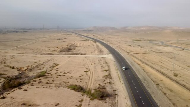 Panoramic clockwise from the sky on  the desert Negev with highway and white car
