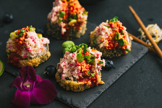 Sushi. Sushi with surimi. Decorated sushi with surimi, wasabi and ginger. 