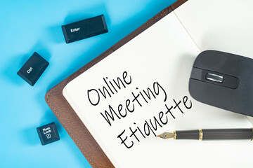 Business concept. Layout of notebook, mouse, pen, keyboard buttons and text online meeting etiquette