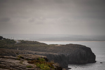 scenic road running along the coastline of the ocean