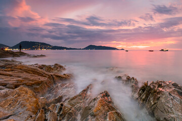 Obraz premium Fishing at dusk in Kalim beach, Phuket