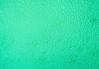 Fototapeta na wymiar foam texture close up , porous bubble background macro , colored monochrome liquid backdrop