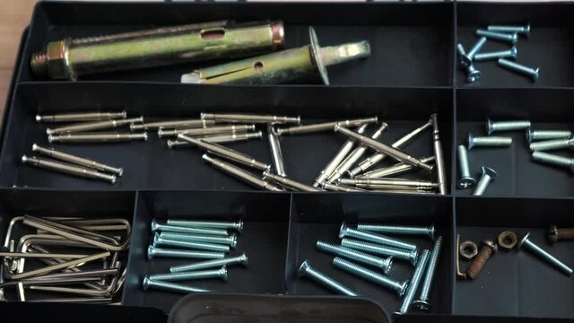 special suitcase with nails and bolts