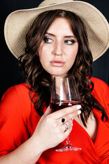 Beautiful woman drinking red wine