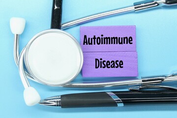 stethoscope, colored board pen with the word autoimmune disease