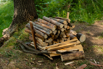 Stack of firewood for making fire and cooking food on camping.