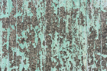 Old peeling paint on galvanized metal sheet, background, texture