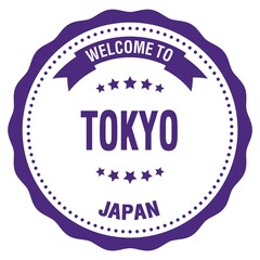 WELCOME TO TOKYO - JAPAN, words written on violet stamp