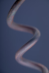 Copper wire non-ferrous metals, product metalworking industry. Abstract metal shapes.