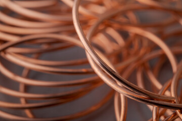 Copper wire non-ferrous metals, product metalworking industry. Abstract metal shapes.