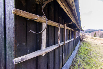 An old wooden ladder used in the first half of the 20th century in the countryside