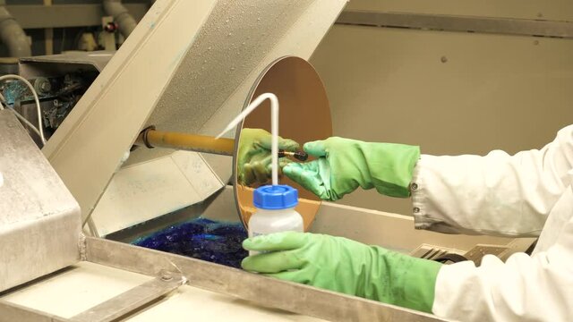 Vinyl record factory: Lacquer is dipped into a nickle bath, where an electro charge fuses the nickle to the silver.