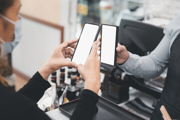 Mobile online payment scanning cashless concept with blank screen