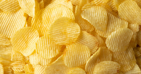 crispy golden potato chips snack texture background