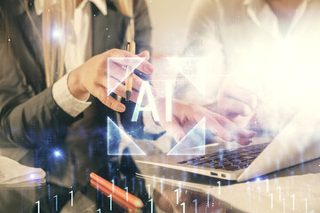 Double exposure of man and woman working together and technology theme drawing hologram. Big data concept. Computer background.