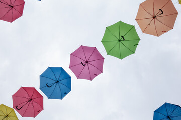 Colorful umbrellas in the sky