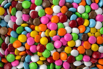 Fototapeta na wymiar Candies. Glazed hazelnuts or almonds. Desserts for candy bars. Small multicolored dragees.