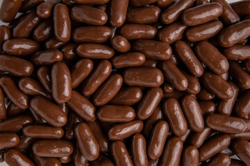 Sweets in milk chocolate, dragees. Desserts for Candybar. Small candies.