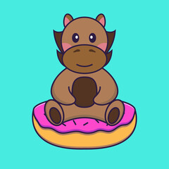 Cute horse is sitting on donuts.