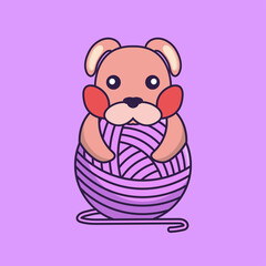 Cute rabbit playing with wool yarn.