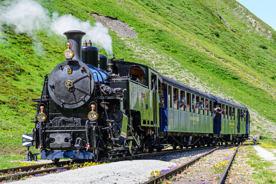 Adventure travel during the coronavirus. Furka steam train. Mountain route. Switzerland.