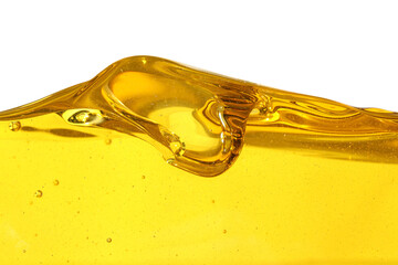 Vegetable oil and air bubbles inside oil isolated on white background.