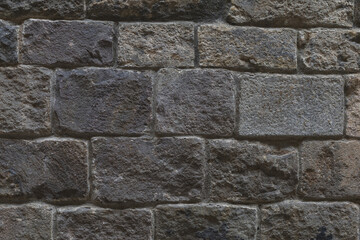 Grey stone wall brick texture, rough ashlar background