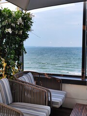 table and chairs on the terrace of a hotel