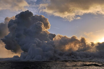 Hawaii. Volcanic eruption. Fiery lava flows into the ocean