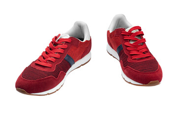 Men's new red sneakers, isolated on white background, full depth of field. Sport shoes. Fashion footwear for running.