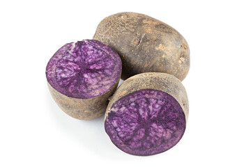 Fresh purple potatoes isolated on a white background.