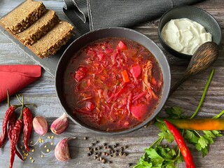 Ukrainian borscht with meat and homemade sour cream	