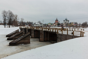 Obraz premium vintage wooden floodgates on the river