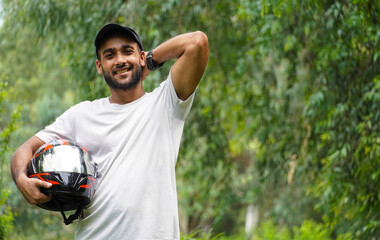 Fototapeta premium a young man with bike helmet