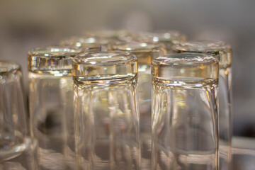 Close up empty glasses in restaurant natural light. selective focus and blur background.