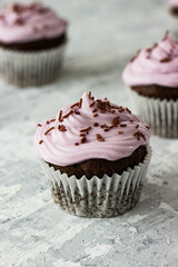Chocolate cupcakes with a purple topping