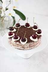 Vegan healthy Blackforest cake with cherries and almond cream