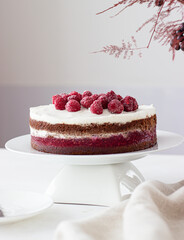 Vegan healthy Blackforest cake with raspberries almond cream
