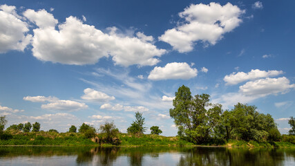 Fototapeta na wymiar Summer day over Warta river in Warta Landscape Park, Poland.