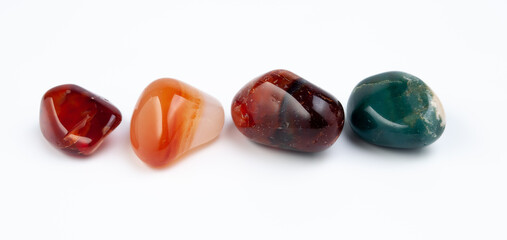 different colorful Semi Precious stones on white background