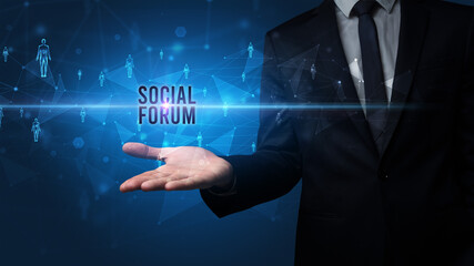 Hand holding social media related inscription